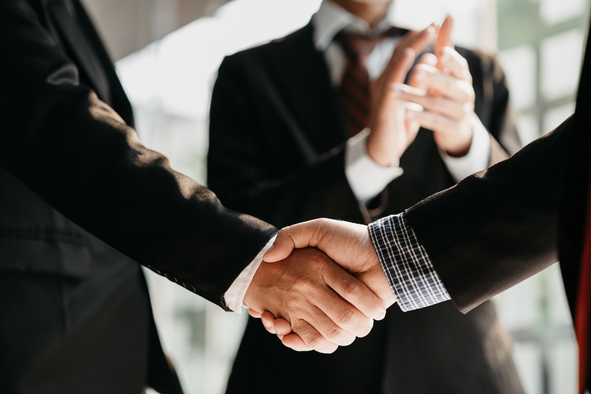 Business dealings and handshakes