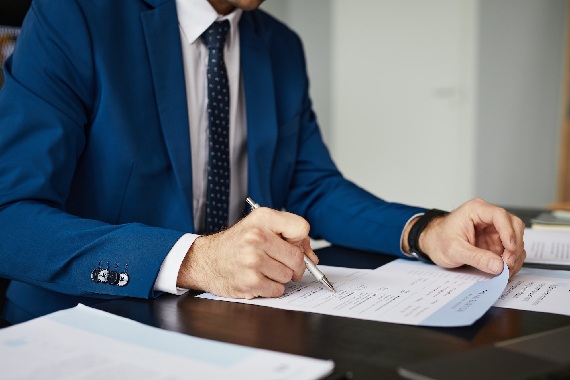 Businessman Signing Document