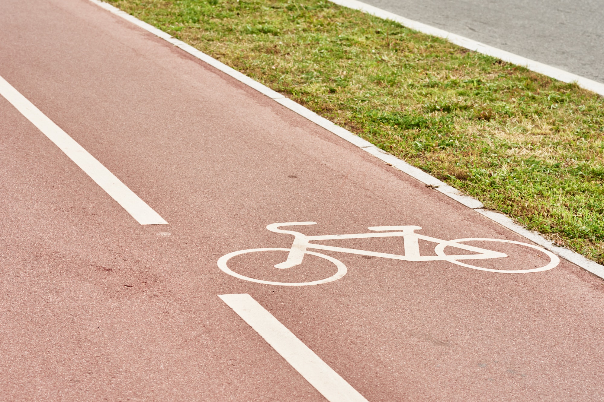 Empty bicycle path in city street