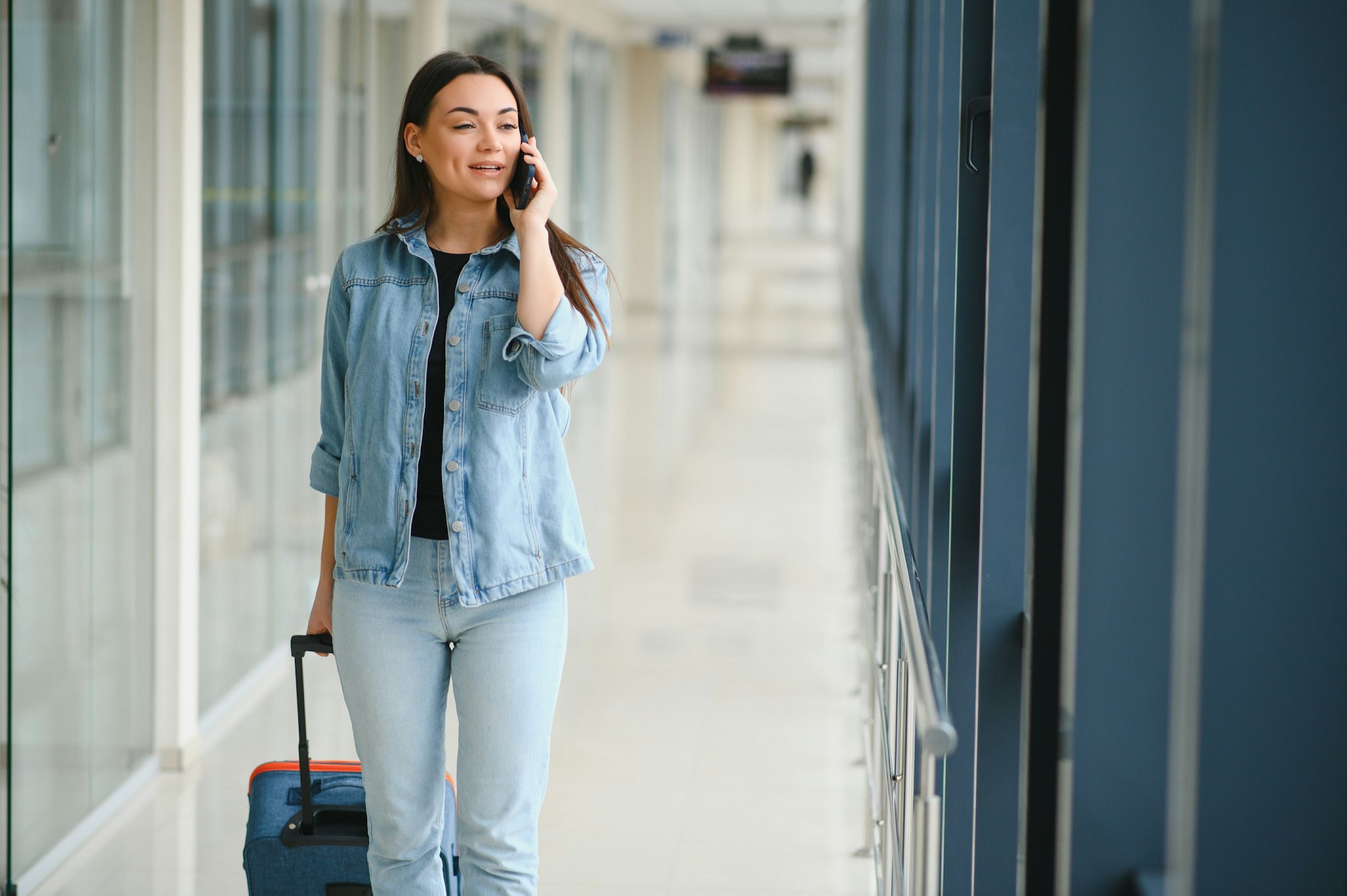 Pretty young female passenger at the airport