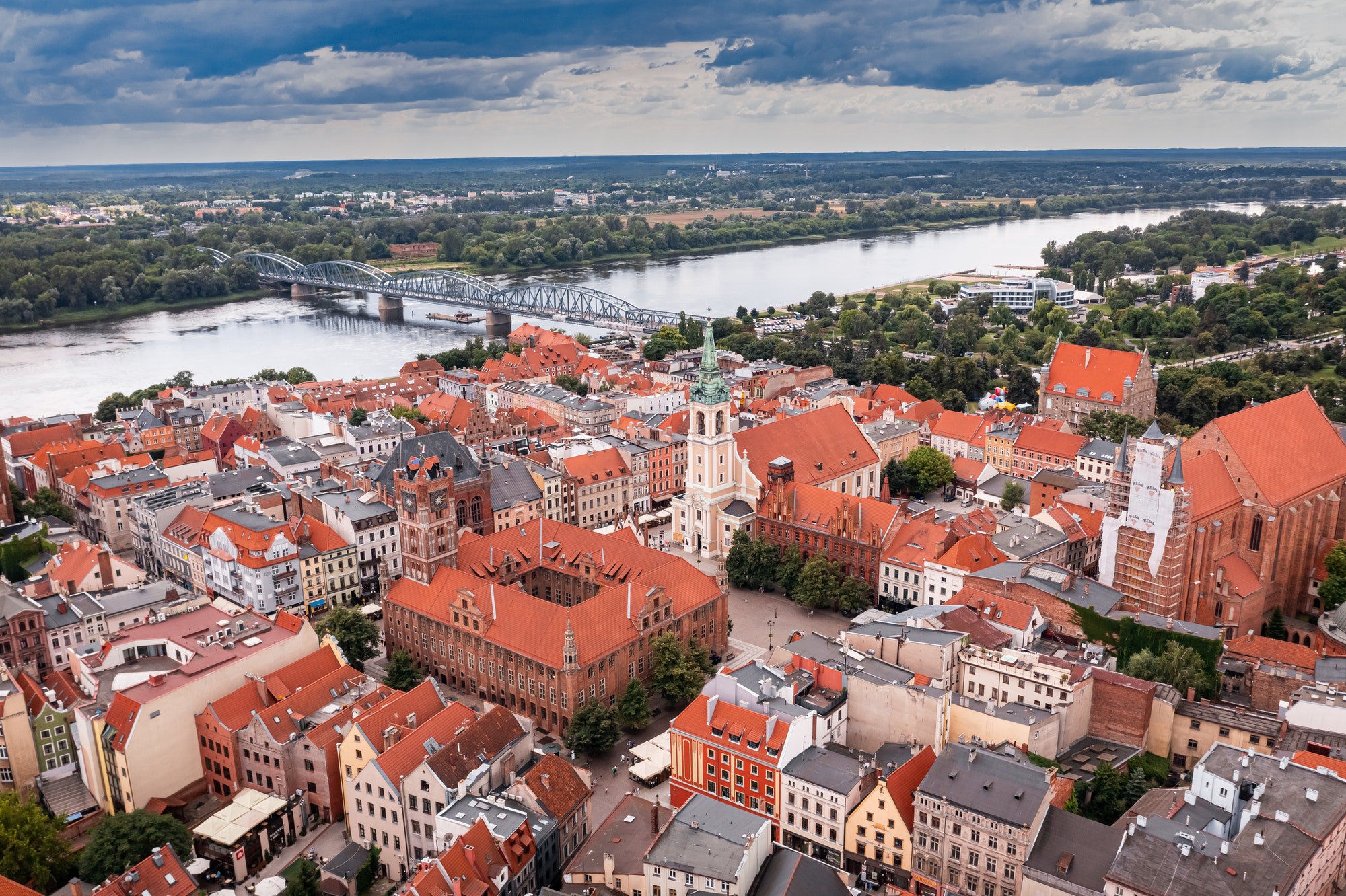 Summer view of Torun old town and Jozef Pilsudski bridge.