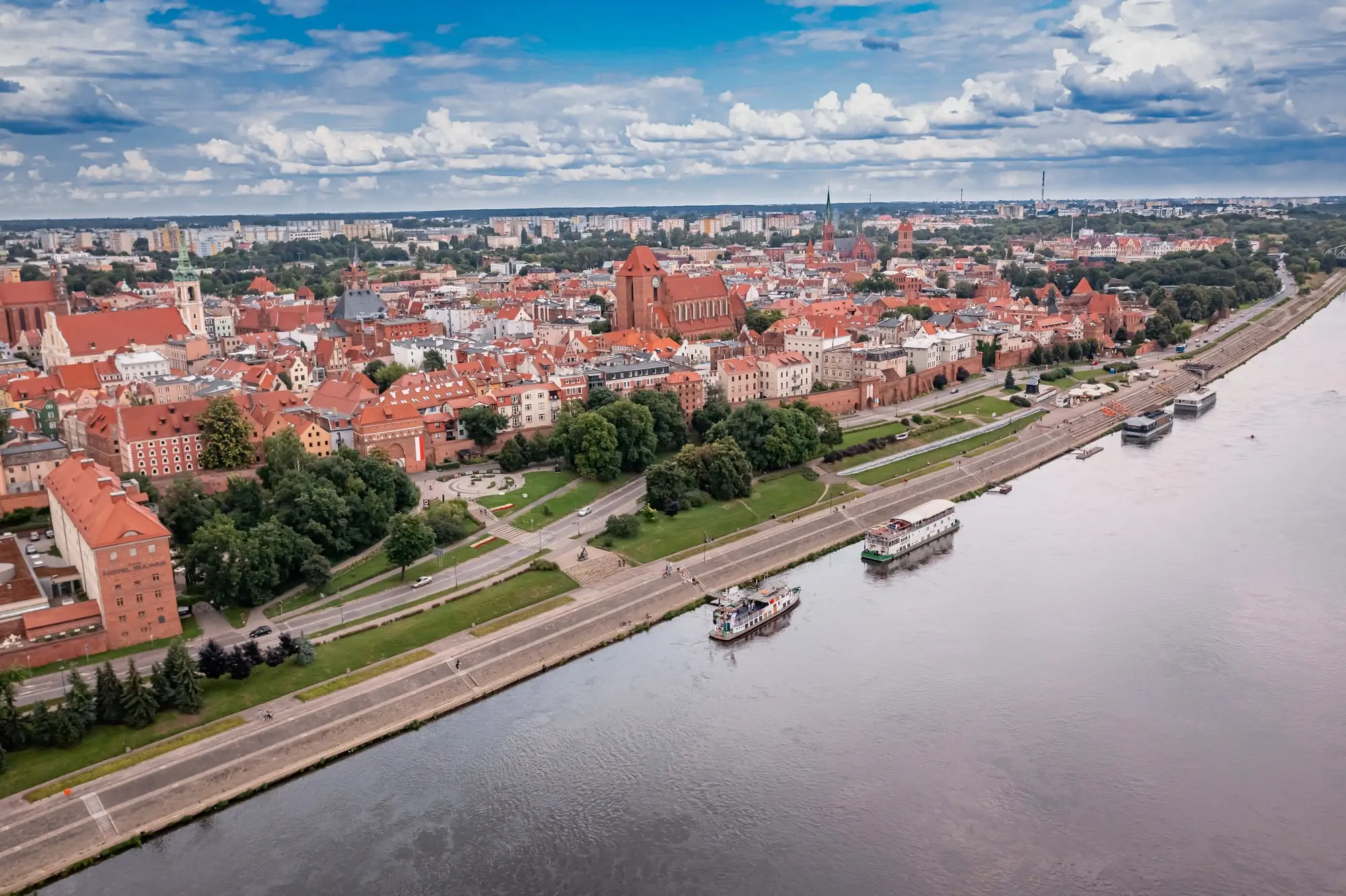 Summer view of Torun old town and Vistula river.